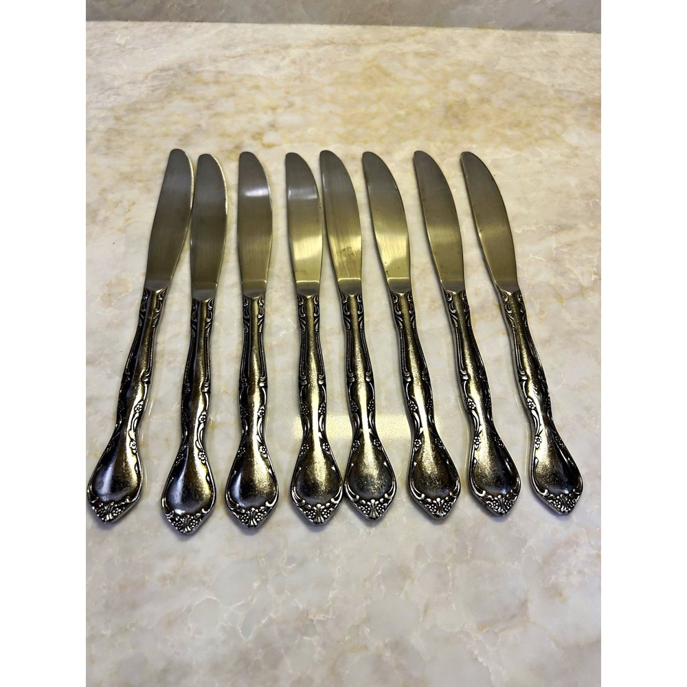 Lot of 8 Towle supreme Japan dinner knives in the pattern Winter Rose